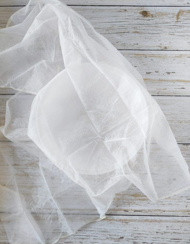 Using a clean gaze to strain helichrysum oil